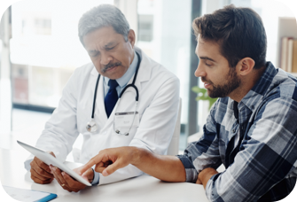 Patient speaking with doctor. Actor portrayal.