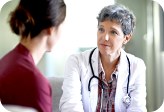 Patient speaking with doctor. Actor portrayal.