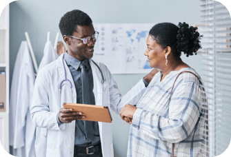 Doctor greeting patient. Actor portrayal.